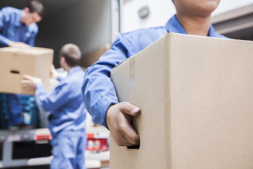 Moving boxes and furniture prepared for house removals in Sladegreen
