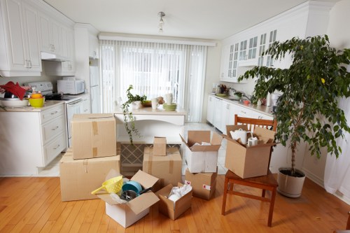 Professional movers loading household items during a Sladegreen removal