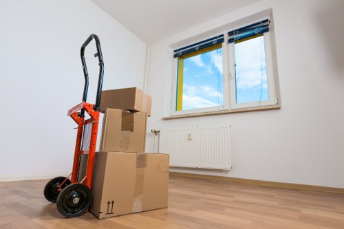 Packed boxes and furniture stored safely for household storage in Sladegreen