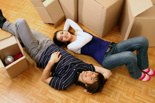 Professional movers handling furniture for small removals in Sladegreen